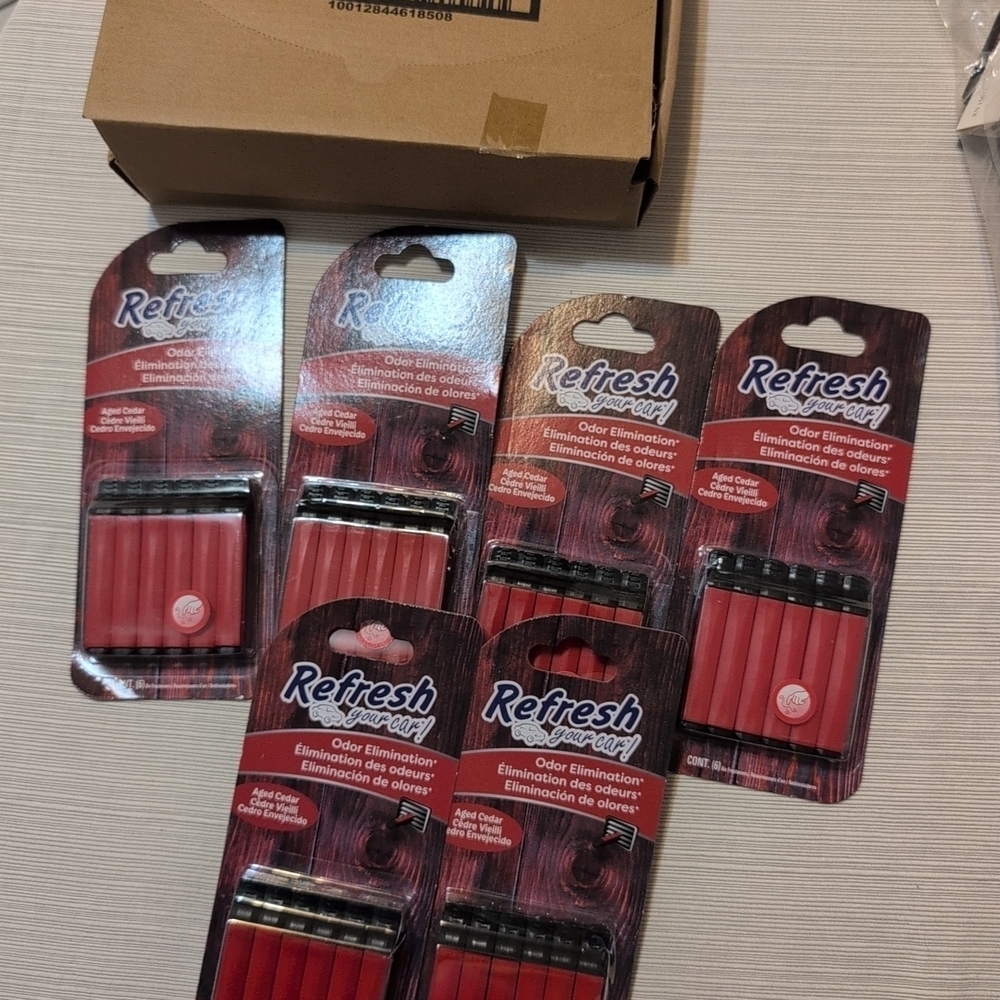 Refresh Odor Eliminator in Red and Black